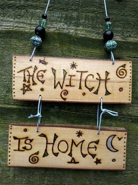 Discover the Artistic Expression of Ashland's Witch Wall Hanging Signs